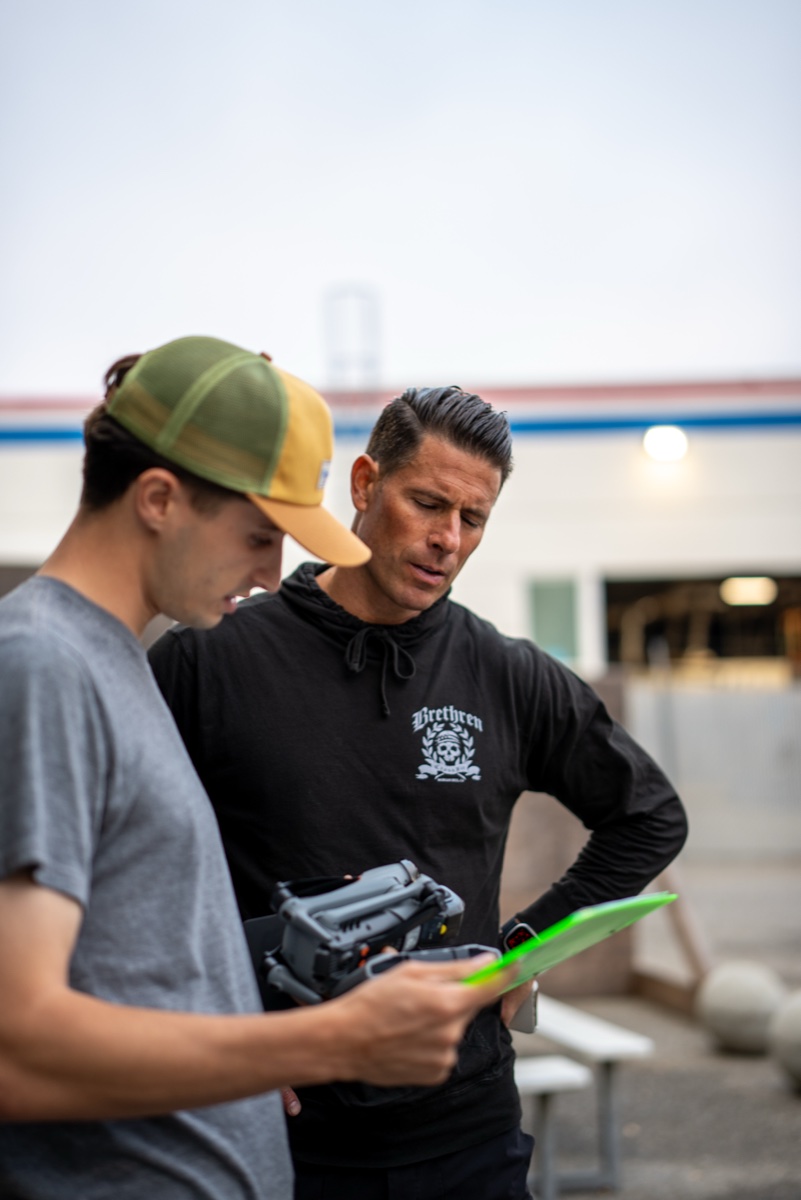 Reviewing the plan on set